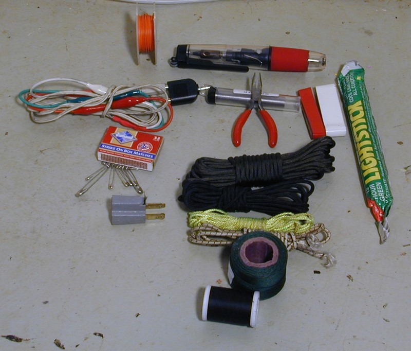 The things kept in the zippered flap portion of my laptop case, electroincs and cordage